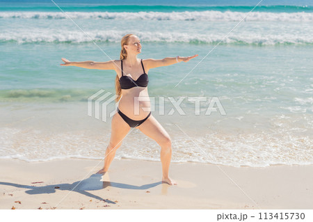 Harmonizing mind and body, a pregnant woman gracefully practices yoga on the beach, embracing the serenity of the seaside for a tranquil and mindful pregnancy experience Harmonizing mind and body, a pregnant woman gracefully practices yoga on the beach, embracing the serenity of the seaside for a tranquil and mindful pregnancy experience 113415730