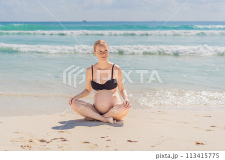 Harmonizing mind and body, a pregnant woman gracefully practices yoga on the beach, embracing the serenity of the seaside for a tranquil and mindful pregnancy experience Harmonizing mind and body, a pregnant woman gracefully practices yoga on the beach, embracing the serenity of the seaside for a tranquil and mindful pregnancy experience 113415775