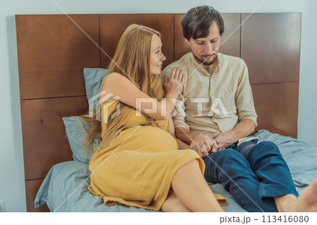 Concerned husband anxiously worries about his wife's pregnancy, seeking reassurance and support Concerned husband anxiously worries about his wife's pregnancy, seeking reassurance and support 113416080