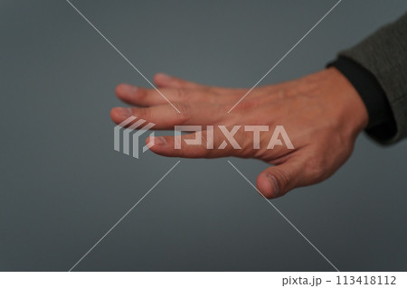 businessman in suit showing five fingers or fingerprint scan touching businessman in suit showing five fingers or fingerprint scan touching 113418112