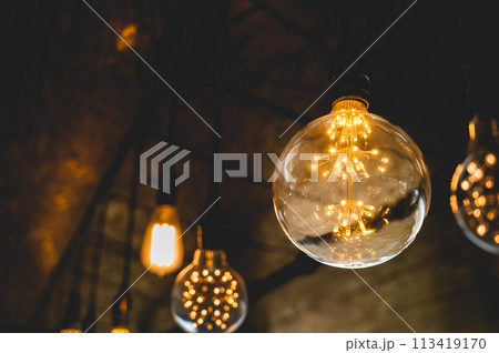 Beautiful vintage light bulb. Retro luxury light bulb hanging decor glowing. Beautiful vintage light bulb. Retro luxury light bulb hanging decor glowing. 113419170