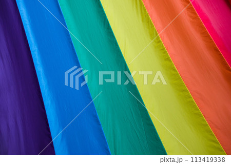 Fabric texture rainbow flag symbol of love or LGBT pride concept. pride month celebrates the festival background. Fabric texture rainbow flag symbol of love or LGBT pride concept. pride month celebrates the festival background. 113419338