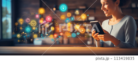 Smiling woman using apps in smartphone. 113419835