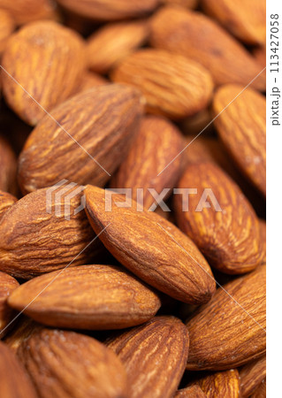 A lot of roasted nuts almond macro 113427058
