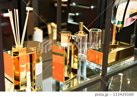 Bathroom accessories in golden design 113429160