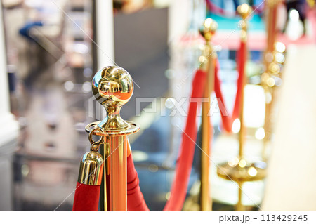 Golden pillars of festive fencing 113429245