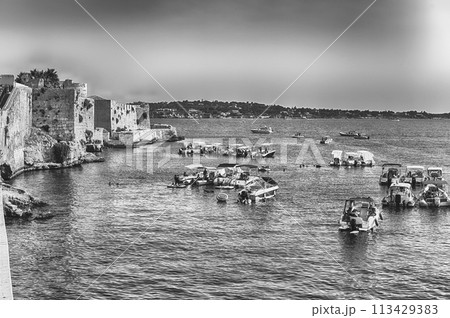 View of the scenic waterfront of Ortygia, Syracuse, Sicily, Italy 113429383