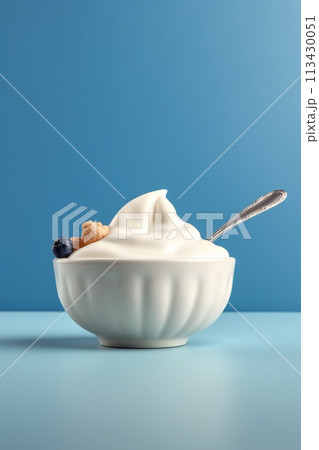 Healthy Greek yogurt with almonds, walnuts, raspberries, and a sprinkle of muesli, frozen yogurt Healthy Greek yogurt with almonds, walnuts, raspberries, and a sprinkle of muesli, frozen yogurt 113430051