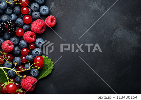 An assortment of fresh blackberries and raspberries isolated on white background. An assortment of fresh blackberries and raspberries isolated on white background. 113430154