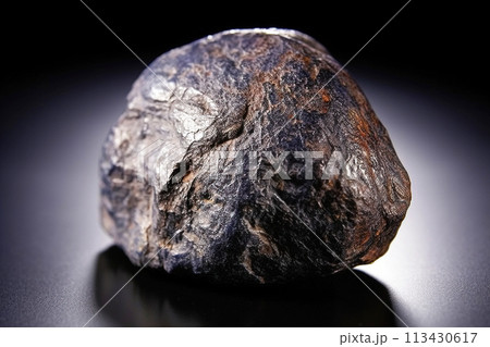 Ixiolite is rare precious natural stone on black background. AI generated. Header banner mockup with space. 113430617