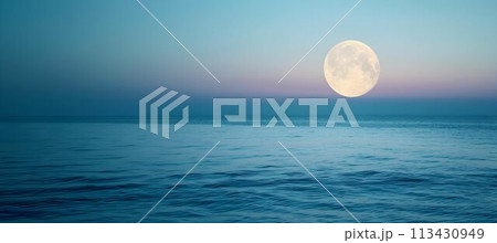 Full moon over blue sea water in pastel sky, evening natural background 113430949