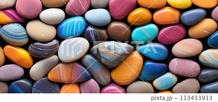 Colorful rocks and pebbles, featuring a spectrum of multicolored and striped variations, Ai Generated 113433913