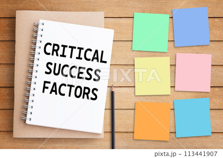 Business quotes, CRITICAL SUCCESS PACTORS on notebook or paper in office desk, office workplace Business quotes, CRITICAL SUCCESS PACTORS on notebook or paper in office desk, office workplace 113441907