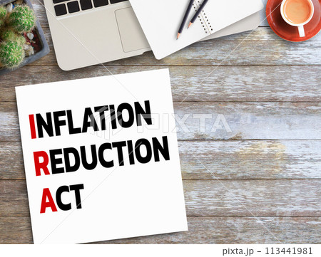 Business quotes, Concept words, INFLATION, REDUCTION, ACT on notebooks or paper in office desk 113441981