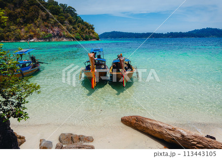 Wooden boat at the clear beach on the island,Long tail boat 113443105