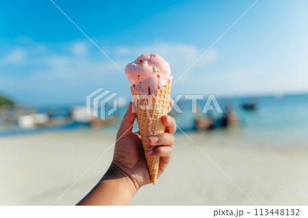 Ice cream cone at the beach in summer 113448132