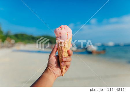 Ice cream cone at the beach in summer 113448134