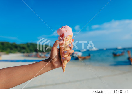 Ice cream cone at the beach in summer 113448136