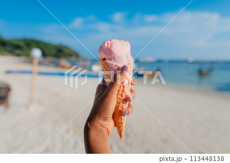 Ice cream cone at the beach in summer 113448138