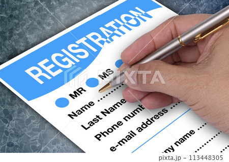 Someone writing his detail to register form. 113448305