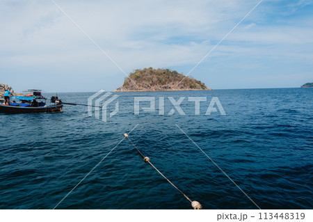 On a long-tail boat, go snorkeling at various islands 113448319