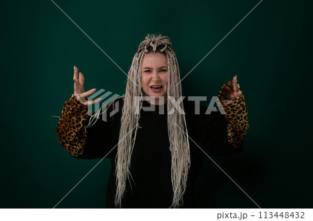 Woman With Long White Hair and Leopard Print Jacket Woman With Long White Hair and Leopard Print Jacket 113448432