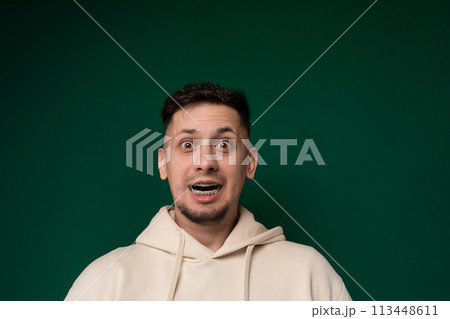 Surprised Man Looking at Something Unexpected Surprised Man Looking at Something Unexpected 113448611