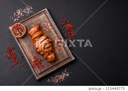 Delicious kebab of chicken or pork meat with salt, spices and herbs Delicious kebab of chicken or pork meat with salt, spices and herbs 113448773