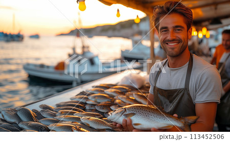 Young fishmonger with fresh catch fish market. Healthy seafood concept for design and lifestyle Young fishmonger with fresh catch fish market. Healthy seafood concept for design and lifestyle 113452506