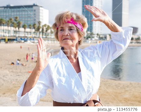Mature lady in kimono outdoors Mature lady in kimono outdoors 113455776