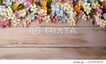 Wooden background with spring flowers and copy space 113455872