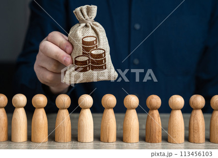 A man holds money bag of coins above the crowd. Deposits and loans. Budgetary funds for social policy. Crowdfunding and fundraising. Social politics. Salaries. 113456103