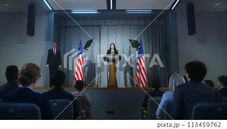 US presidential candidate comes to tribune, starts performance 113459762
