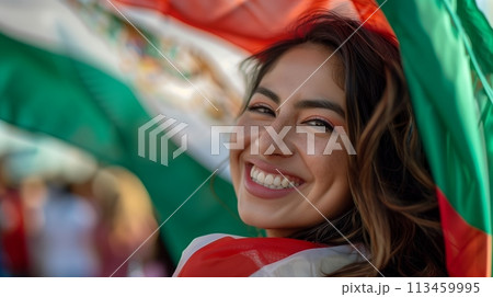 Smiling and happy woman is holding a Mexican flag 113459995
