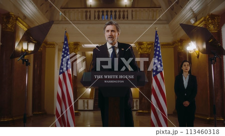 Mature congressman during press conference in the White House 113460318