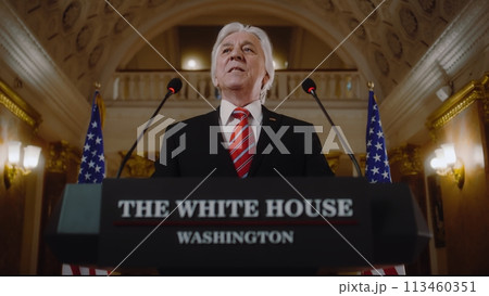 US government representative gives political speech at press conference US government representative gives political speech at press conference 113460351