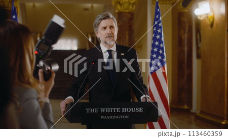 Minister or congressman answers journalists questions in the White House Minister or congressman answers journalists questions in the White House 113460359