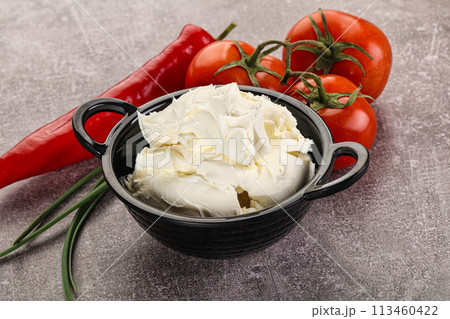 Soft Philadephia cheese in the bowl 113460422