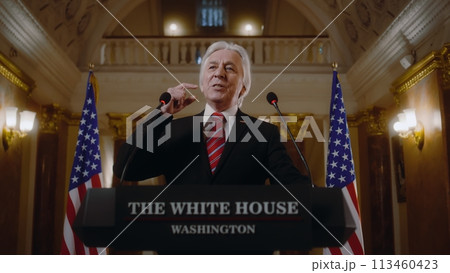 US government representative gives political speech at press conference US government representative gives political speech at press conference 113460423