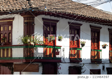 Beautiful facade of the houses at the historical downtown of the heritage town of Salamina located at the Caldas department in Colombia. 113464397
