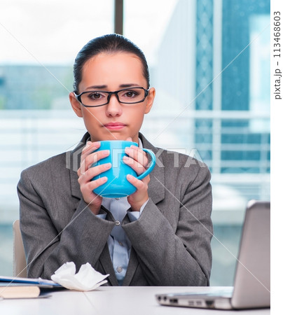 Young businesswoman working in the office 113468603