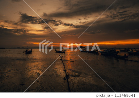 Wooden boat on the beach on the island 113469341