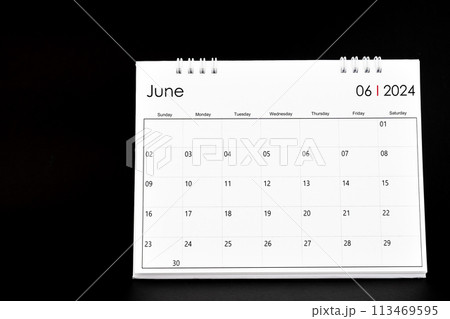 Desk Calendar for June 2024. Desktop calendar on a black color. 113469595
