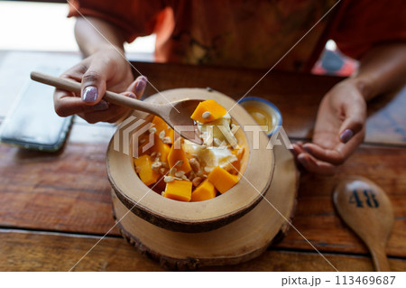 Mango yogurt on the table in a dessert shop 113469687