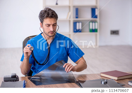 Young male doctor radiologist working in the clinic 113470607