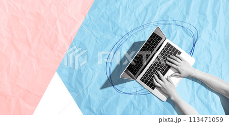Person using a laptop computer with crumpled paper texture 113471059