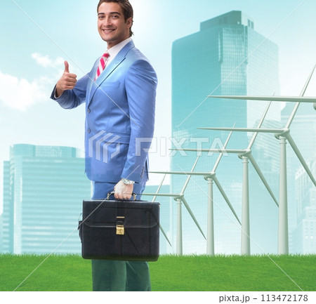 Green energy anc ecology concept with businessman Green energy anc ecology concept with businessman 113472178