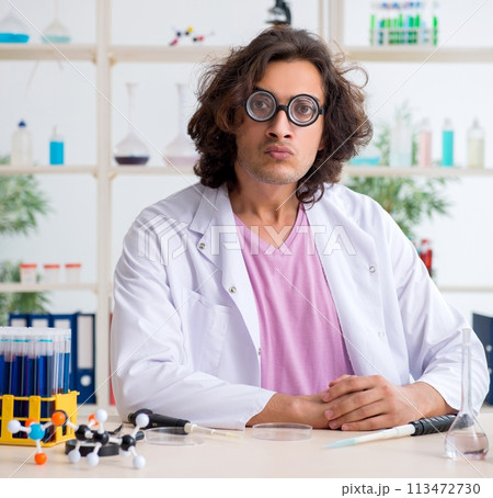 Funny male chemist working in the lab 113472730