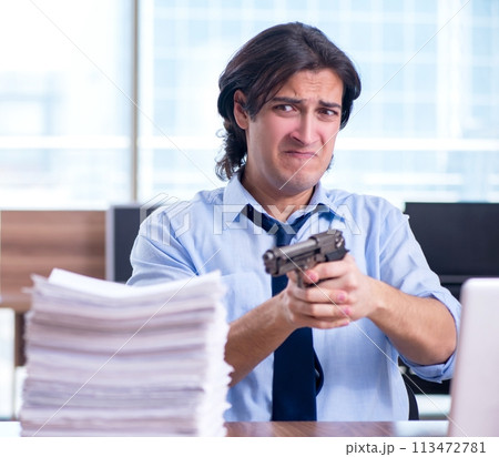 Young employee unhappy with excessive work 113472781