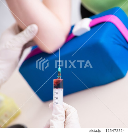 Young pregnant woman in blood transfusion concept Young pregnant woman in blood transfusion concept 113472824